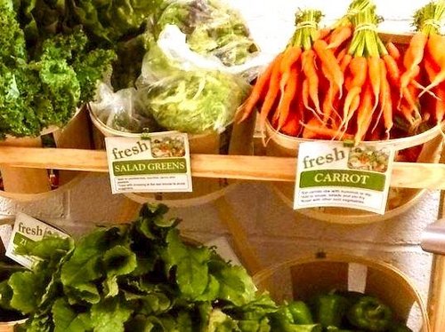Fresh vegetables on wooden shelf